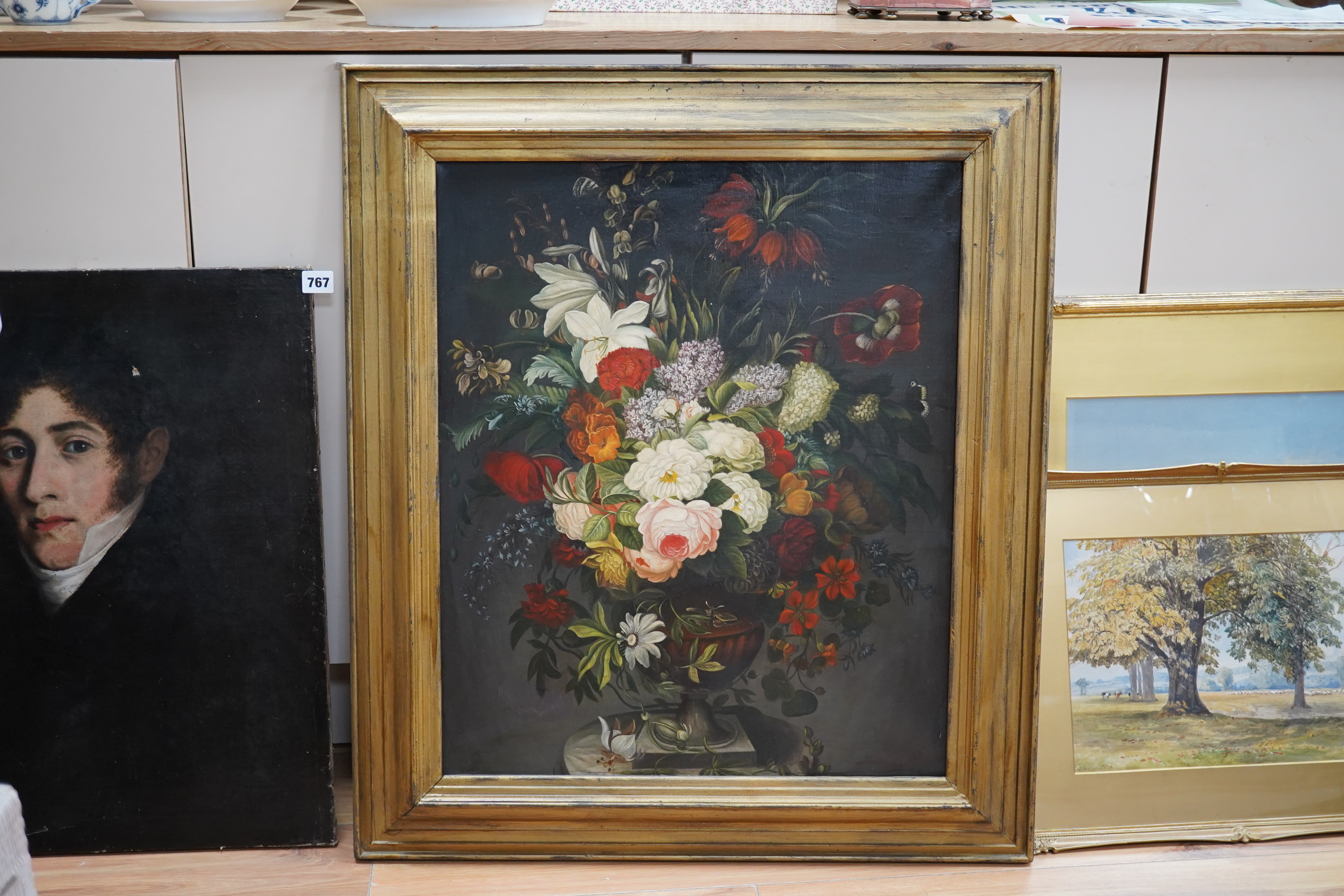 Continental School, oil on canvas, Still life of flowers in a vase, unsigned, 62 x 51cm, gilt framed. Condition - good